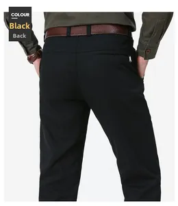 Detailed back view of men's slim black trousers featuring a secure single zipper pocket
