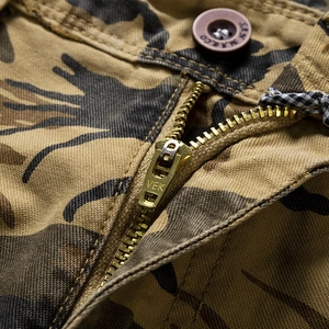 Men's camo cargo shorts featuring a premium metal zipper and branded resin button details