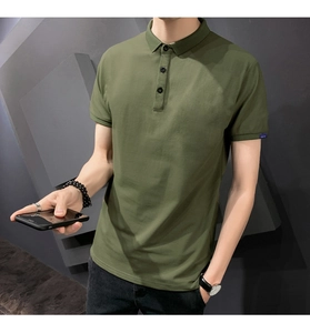 Close-up of olive green slim fit polo shirt with ribbed cuffs and three-button collar