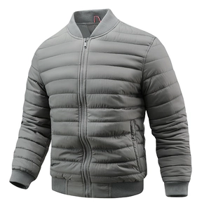 Detail of grey quilted baseball jacket featuring ribbed collar with tricolor ribbon detail