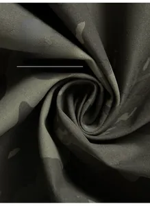 Close-up of durable camouflage fabric with high-density weave for outdoor sports jackets