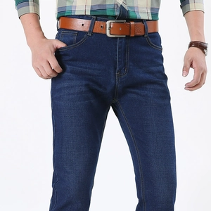 Men's dark blue straight leg jeans with whiskers and a brown leather belt