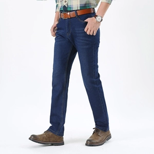 Men's dark blue straight leg denim jeans in a classic business casual style with brown belt