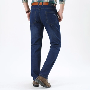 Men's classic dark blue straight leg denim jeans with yellow contrast stitching and back pockets