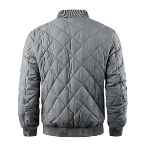 Rear view of grey men's quilted bomber jacket showing diamond patterns and ribbed hem