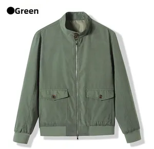 Detail view of military green Harrington jacket with stand collar and metal zipper pockets