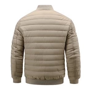 Detail view of khaki quilted men's bomber jacket showing ribbed collar and horizontal stitching