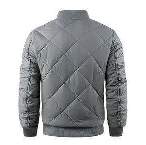 Detail view of the quilted diamond pattern and ribbed hem on the grey bomber jacket back