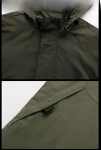 Detailed view of the olive green hooded jacket with DTX.SPIRIT embroidery and mountain patch