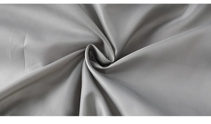 Close-up of premium gray metallic fabric showing soft texture and smooth sheen for men's jacket