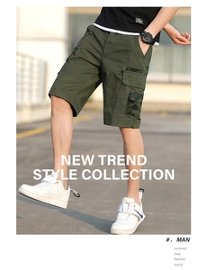 Detail of army green cargo shorts featuring camouflage patchwork pockets for men
