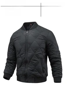 Detail of black quilted men's jacket with classic diamond pattern and ribbed standing collar