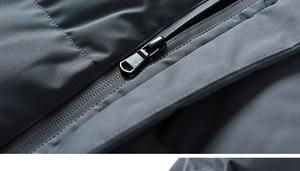 Macro view of heavy metal zipper and waterproof fabric on men's winter jacket