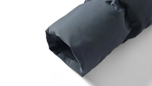 Close-up of windproof cuffs on a thick winter jacket with high-quality stitching detail