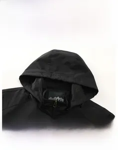 Detailed close-up of a men's hooded windbreaker with zip-up collar and mesh lining