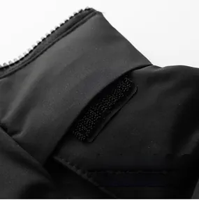 Detail of windproof stand collar with adjustable velcro strap and durable zipper closure