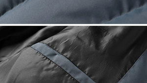 Macro detail of waterproof blue fabric and black inner lining with reinforced stitching