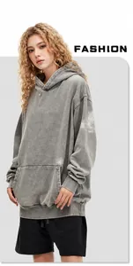 Detail of gray washed hoodie showing vintage texture and spacious kangaroo pocket on front