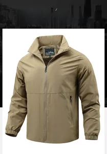 Detailed view of khaki outdoor jacket with stand collar and zip pockets for men