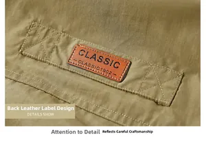 Close-up of olive green cargo jacket with classic 1902 embossed leather patch detail