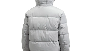 Detailed back view of a light gray hooded puffer jacket with classic horizontal quilting