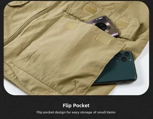 Dettaglio del gilet da pesca tattico kaki con grandi tasche a patta per smartphone