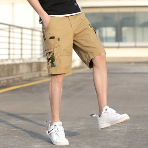 Men's khaki cargo shorts with camouflage pocket details and a loose straight fit