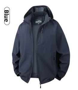 Detail of blue windproof jacket with grey breathable mesh lining and zippered pocket