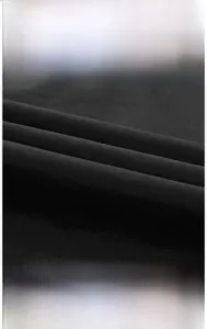 Close-up of black breathable mesh fabric for quick-dry fishing vest showing durable texture