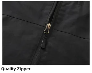 Close-up detail of a durable black zipper with bronze metal slider on men's jacket