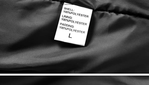 Close-up of garment label showing 100% polyester material and size L for winter jacket