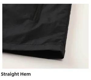 Detail view of a black lightweight jacket featuring a clean straight hem design