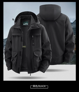 Detail view of black outdoor tactical hooded jacket with multi-pockets and mesh lining