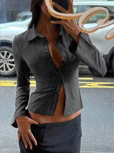 Close-up of dark grey pinstripe long sleeve slim fit cardigan with button detail