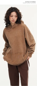 Detail view of 425g washed heavy cotton hoodie in earthy brown with vintage texture