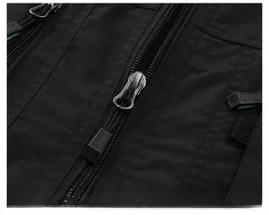 Detail of multi-pocket fishing vest featuring high-quality zippers and durable fabric texture