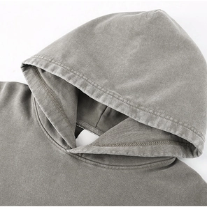 Detail view of double-layered hood and washed charcoal grey fabric on heavy cotton hoodie