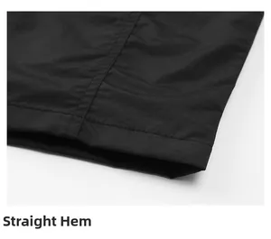 Detail view of the straight hem and durable double stitching on the black fishing vest