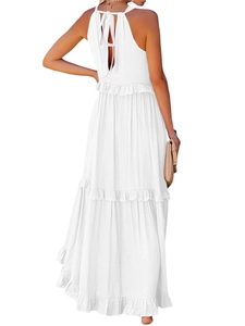 Back view of elegant white tiered ruffle maxi dress with halter neck tie design