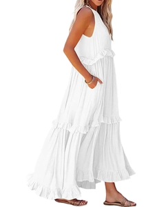 Detailed side view of a white tiered maxi dress with functional pockets and ruffles