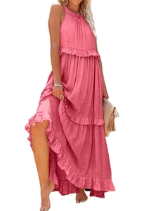 Detail view of pink tiered maxi dress with ruffled layers and gathered bodice texture