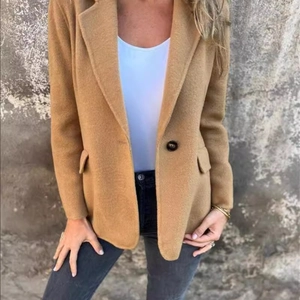Women's camel wool coat with notched lapel and single button closure for autumn style