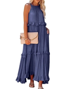 Detail of multi-layered navy blue tiered maxi dress with ruffled edges and fabric texture
