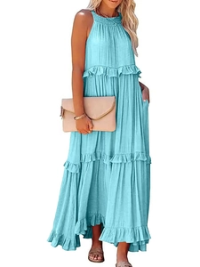 Detail of light blue tiered maxi dress showing layered ruffles and textured fabric weave