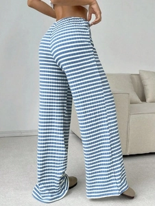 Detailed macro view of the blue and white ribbed texture on these wide-leg casual pants