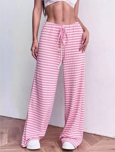 Detail showing the pink and white striped rib-knit fabric texture and drawstring waist