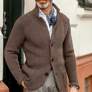 Close-up of brown waffle textured cardigan for men with stand collar and buttons