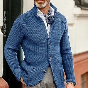 Close-up of blue waffle texture knit cardigan with stand collar and buttons for men