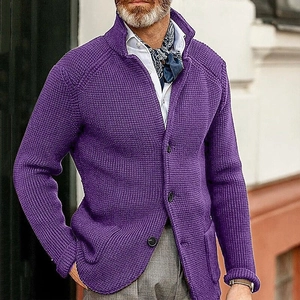 Detail of purple waffle knit cardigan featuring stand collar and round black buttons
