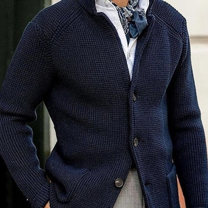 Men's slim-fit navy waffle knit cardigan with textured fabric and classic buttons